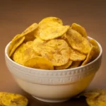 Jaambu Kerala Nendran Banana Chips, Pepper in a ceramic bowl